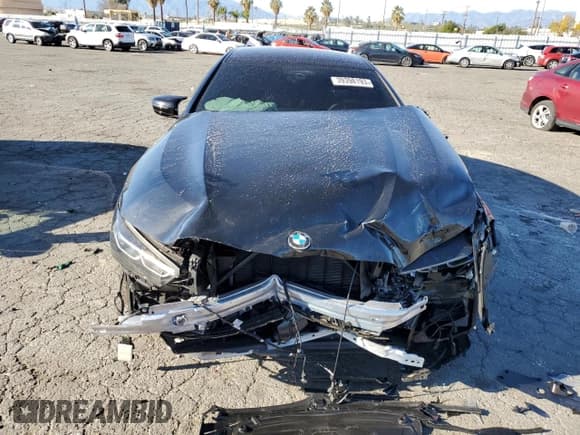 ✅ 2023 BMW 8 Series M850i • VIN: WBAGV8C06PCL57473 • Lot: 39398193. Listed on Copart with Not provided. Free auction sales archive from the USA and detailed vehicle history report at DreamBid. Image 5.