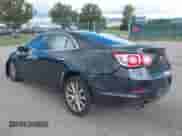 2016 Chevrolet Malibu LTZ z VIN 1G11E5SA4GU105094, wystawiony jako IAAI lot #43108630 z przebiegiem 105 242 mil mil oraz . Historia ofert i sprzedaży dostępna na DreamBid. Obrazek 3.