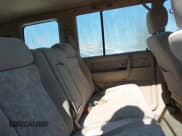 ✅ 2000 Isuzu Trooper S • VIN: JACDJ58X7Y7J06010 • Lot: 42002763. Listed on IAAI with 165,285 mi. Free auction sales archive from the USA and detailed vehicle history report at DreamBid. Image 8.