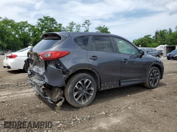 ✅ 2016 Mazda CX-5 Grand Touring • VIN: JM3KE4DY0G0846440 • Lot: 85829135. Wystawiony na Copart z przebiegiem 116 754 mil. Bezpłatny archiwum sprzedaży aukcyjnych z USA i szczegółowy raport historii pojazdu na DreamBid. Zdjęcie 3.