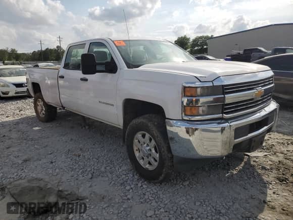 2015 Chevrolet Silverado 2500HD Work Truck z VIN 1GC1KUEG4FF128047, wystawiony jako Copart lot #52867355 z przebiegiem 91 860 mil mil oraz Szkoda całkowita • Salvage title. Historia ofert i sprzedaży dostępna na DreamBid. Obrazek 1.