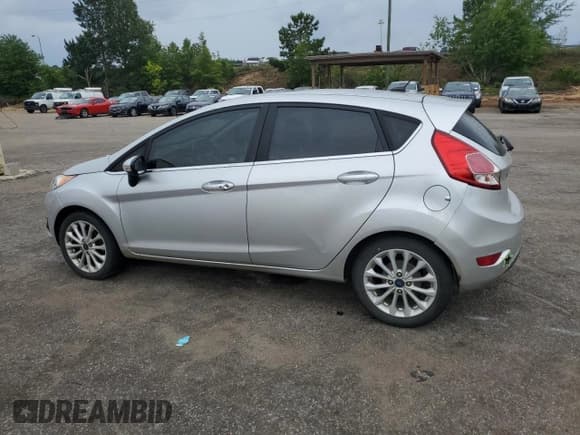 ✅ 2017 Ford Fiesta Titanium • VIN: 3FADP4FJ3HM136481 • Lot: 59622785. Listed on Copart with 130,658 mi. Free auction sales archive from the USA and detailed vehicle history report at DreamBid. Image 2.