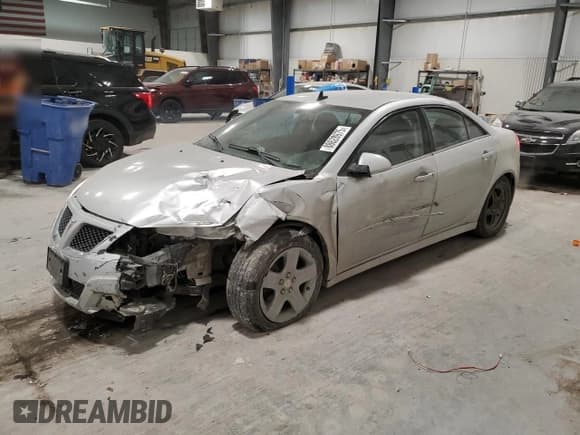 ✅ 2010 Pontiac G6 1SC • VIN: 1G2ZA5E02A4166013 • Lot: 88628975. Listed on Copart with 165,269 mi. Free auction sales archive from the USA and detailed vehicle history report at DreamBid. Image 1.