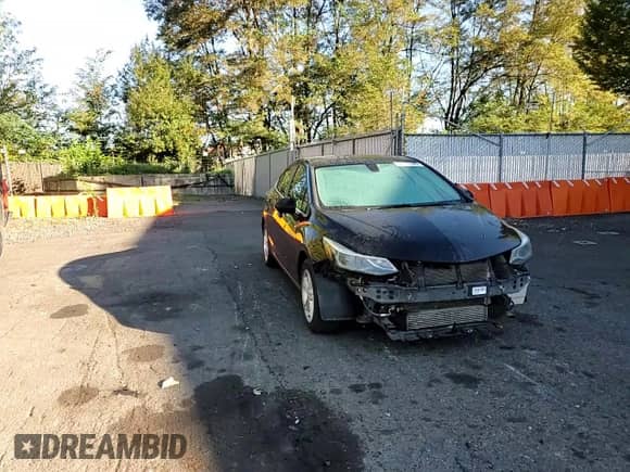 2018 Chevrolet Cruze LT z VIN 1G1BE5SM9J7224392, wystawiony jako Copart lot #82199325 z przebiegiem 156 330 mil mil oraz Szkoda całkowita • Salvage title. Historia ofert i sprzedaży dostępna na DreamBid. Obrazek 13.