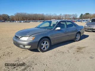 ✅ 1999 Lexus ES 300 • VIN: JT8BF28G0X5061056 • Lot: 97270455. Listed on Copart with 150,146 mi. Free auction sales archive from the USA and detailed vehicle history report at DreamBid. Image 1.
