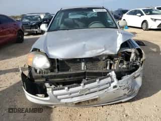 2004 Hyundai Accent GL with VIN KMHCG35C94U292013, listed as a Copart auction lot 84253364 with Not provided miles and Salvage title. Bid and sale history available at DreamBid. Image 5.