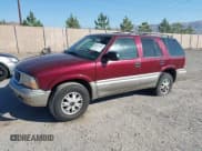 ✅ 2000 GMC Jimmy SLE Convenience • VIN: 1GKDT13W0Y2282174 • Lot: 42617150. Listed on IAAI with 166,906 mi. Free auction sales archive from the USA and detailed vehicle history report at DreamBid. Image 2.