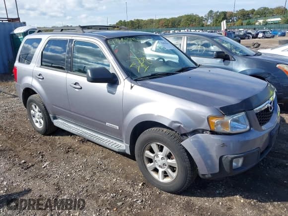 ✅ 2008 Mazda Tribute Grand Touring • VIN: 4F2CZ96188KM16367 • Lot: 43463966. Listed on IAAI with 107,387 mi. Free auction sales archive from the USA and detailed vehicle history report at DreamBid. Image 1.