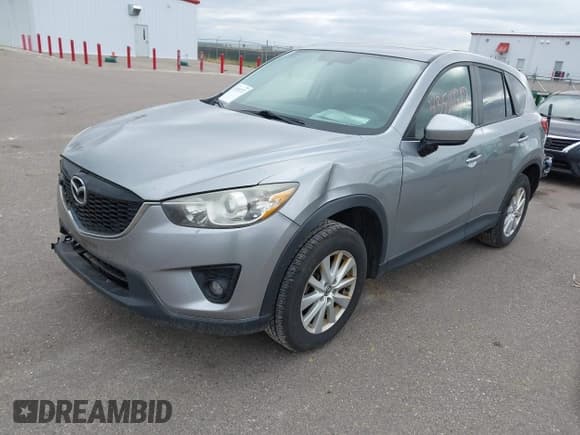 ✅ 2014 Mazda CX-5 Touring • VIN: JM3KE4CY4E0380252 • Lot: 43510717. Wystawiony na IAAI z przebiegiem 207 051 mil. Bezpłatny archiwum sprzedaży aukcyjnych z USA i szczegółowy raport historii pojazdu na DreamBid. Zdjęcie 2.