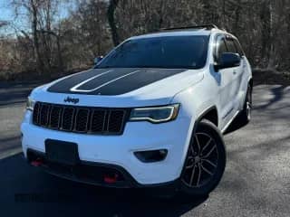 2017 Jeep Grand Cherokee Trailhawk with VIN 1C4RJFLG2HC793117, listed as a Copart auction lot 85492355 with 130,015 mi miles and Clean title. Bid and sale history available at DreamBid. Image 1.