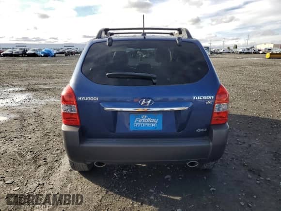 2009 Hyundai Tucson SE with VIN KM8JN72D89U977046, listed as a Copart auction lot 80712994 with 60,863 mi miles and Salvage title. Bid and sale history available at DreamBid. Image 6.