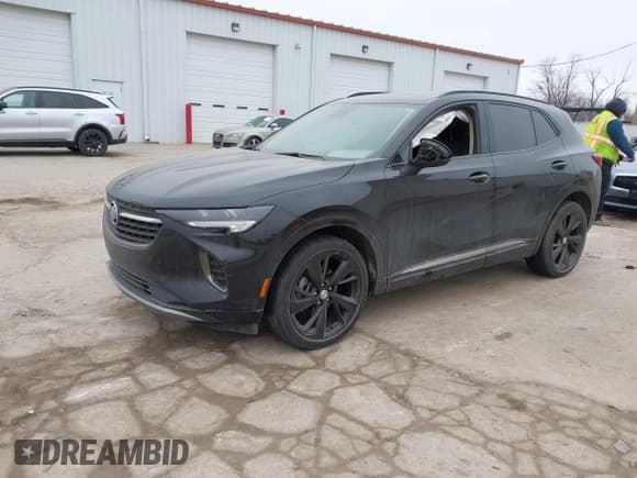 ✅ 2021 Buick Envision Essence • VIN: LRBFZPR42MD099979 • Lot: 41557999. Listed on IAAI with 80,572 mi. Free auction sales archive from the USA and detailed vehicle history report at DreamBid. Image 2.