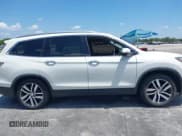 ✅ 2018 Honda Pilot Elite • VIN: 5FNYF6H00JB058623 • Lot: 42323415. Listed on IAAI with 102,015 mi. Free auction sales archive from the USA and detailed vehicle history report at DreamBid. Image 14.