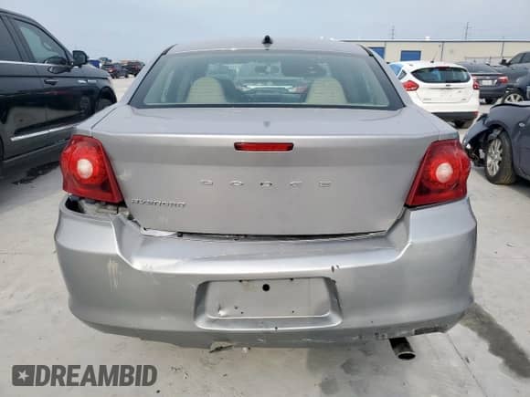 2013 Dodge Avenger SE with VIN 1C3CDZAB8DN666946, listed as a Copart auction lot 70590785 with 173,172 mi miles and Salvage title. Bid and sale history available at DreamBid. Image 6.