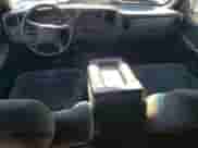 2002 Chevrolet Silverado 1500 with VIN 1GCEC19T02E150146, listed as a Copart auction lot 77425664 with 295,228 mi miles and Salvage title. Bid and sale history available at DreamBid. Image 8.