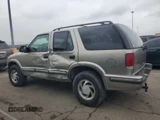 1999 Chevrolet Blazer LS with VIN 1GNDT13W9X2193172, listed as a Copart auction lot 85622594 with 160,054 mi miles and Salvage title. Bid and sale history available at DreamBid. Image 2.