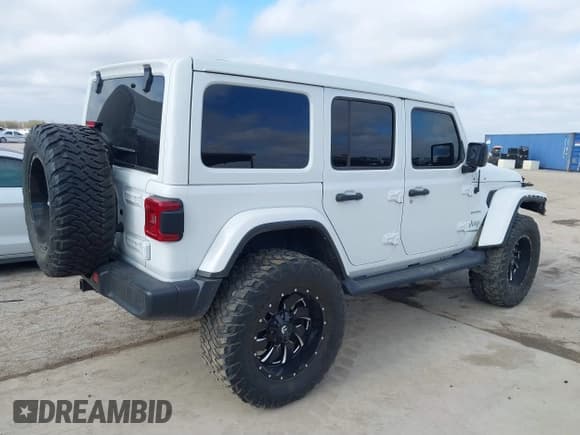 ✅ 2021 Jeep Wrangler Unlimited Sahara • VIN: 1C4HJXEN3MW717895 • Lot: 41472929. Listed on IAAI with 58,001 mi. Free auction sales archive from the USA and detailed vehicle history report at DreamBid. Image 4.