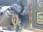 ✅ 2004 Cadillac Escalade • VIN: 1GYEK63N14R200973 • Lot: 42926800. Listed on IAAI with 261,068 mi. Free auction sales archive from the USA and detailed vehicle history report at DreamBid. Image 11.