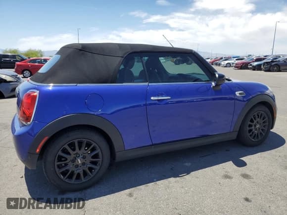 ✅ 2021 MINI Convertible Cooper • VIN: WMWWJ3C06M3N02193 • Лот: 57446765. Опубликован ранее на Copart с пробегом 72 956 миль. Бесплатный доступ к архиву аукционных продаж из США и подробный отчёт об истории автомобиля на DreamBid. Изображение 3.
