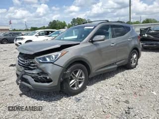 ✅ 2017 Hyundai Santa Fe 2.4L • VIN: 5NMZU3LB5HH049667 • Лот: 52507874. Опубликован ранее на Copart с пробегом 87 085 миль. Бесплатный доступ к архиву аукционных продаж из США и подробный отчёт об истории автомобиля на DreamBid. Изображение 1.