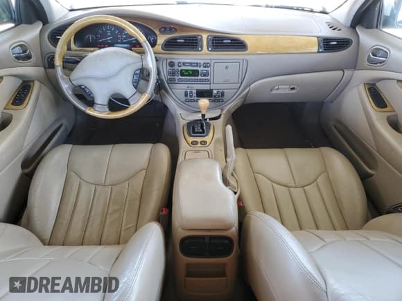 ✅ 2000 Jaguar S-Type V8 • VIN: SAJDA01D7YGL39410 • Lot: 56814185. Wystawiony na Copart z przebiegiem 47 861 mil. Bezpłatny archiwum sprzedaży aukcyjnych z USA i szczegółowy raport historii pojazdu na DreamBid. Zdjęcie 8.