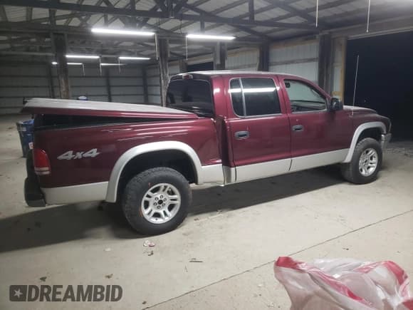 ✅ 2003 Dodge Dakota SLT • VIN: 1D7HG48N63S215614 • Lot: 82770034. Wystawiony na Copart z przebiegiem 174 211 mil. Bezpłatny archiwum sprzedaży aukcyjnych z USA i szczegółowy raport historii pojazdu na DreamBid. Zdjęcie 3.