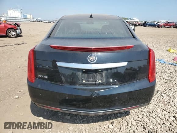 ✅ 2013 Cadillac XTS • VIN: 2G61N5S31D9128028 • Lot: 80052795. Wystawiony na Copart z przebiegiem 78 218 mil. Bezpłatny archiwum sprzedaży aukcyjnych z USA i szczegółowy raport historii pojazdu na DreamBid. Zdjęcie 6.