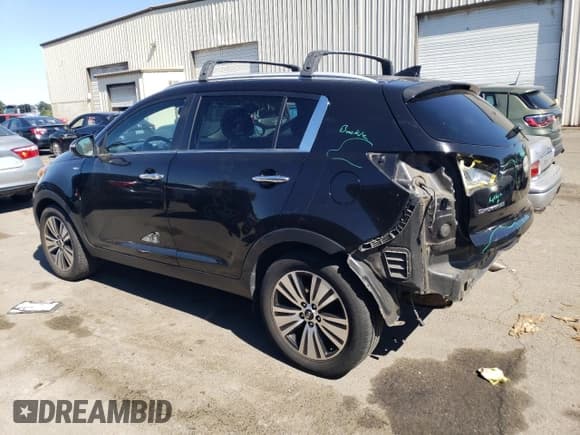 ✅ 2014 Kia Sportage EX • VIN: KNDPCCAC4E7599869 • Lot: 69689325. Listed on Copart with 89,430 mi. Free auction sales archive from the USA and detailed vehicle history report at DreamBid. Image 2.