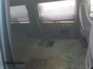 ✅ 1997 Ford Econoline Commercial • VIN: 1FDEE146XVHB36426 • Lot: 68687935. Wystawiony na Copart z przebiegiem 249 954 mil. Bezpłatny archiwum sprzedaży aukcyjnych z USA i szczegółowy raport historii pojazdu na DreamBid. Zdjęcie 11.