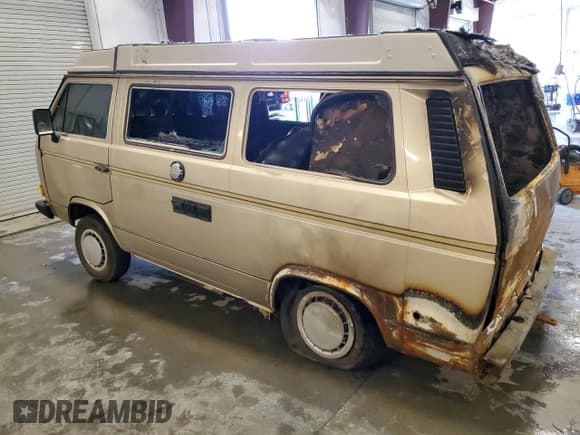 ✅ 1986 Volkswagen Vanagon GL • VIN: WV2ZB0255GH007002 • Лот: 62171325. Опубликован ранее на Copart с пробегом Не указан. Бесплатный доступ к архиву аукционных продаж из США и подробный отчёт об истории автомобиля на DreamBid. Изображение 2.