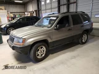 ✅ 1999 Jeep Grand Cherokee Laredo • VIN: 1J4G258S1XC668517 • Lot: 79958454. Listed on Copart with Not provided. Free auction sales archive from the USA and detailed vehicle history report at DreamBid. Image 1.