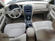 ✅ 2005 Kia Optima LX • VIN: KNAGD126455379263 • Lot: 64826385. Listed on Copart with 78,774 mi. Free auction sales archive from the USA and detailed vehicle history report at DreamBid. Image 8.