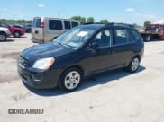 ✅ 2009 Kia Rondo LX • VIN: KNAFG528597278836 • Lot: 42662432. Listed on IAAI with 103,854 mi. Free auction sales archive from the USA and detailed vehicle history report at DreamBid. Image 2.