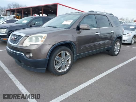 ✅ 2010 GMC Acadia SLT2 • VIN: 1GKLRNEDXAJ124160 • Lot: 43812566. Listed on IAAI with 203,939 mi. Free auction sales archive from the USA and detailed vehicle history report at DreamBid. Image 2.