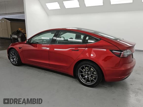 ✅ 2022 Tesla Model 3 • VIN: 5YJ3E1EA2NF291325 • Lot: 60172435. Wystawiony na Copart z przebiegiem 128 928 mil. Bezpłatny archiwum sprzedaży aukcyjnych z USA i szczegółowy raport historii pojazdu na DreamBid. Zdjęcie 2.