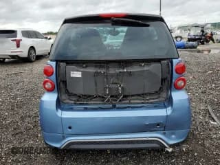 ✅ 2013 Smart fortwo Pure • VIN: WMEEJ3BA7DK599596 • Lot: 73166994. Wystawiony na Copart z przebiegiem 110 919 mil. Bezpłatny archiwum sprzedaży aukcyjnych z USA i szczegółowy raport historii pojazdu na DreamBid. Zdjęcie 6.