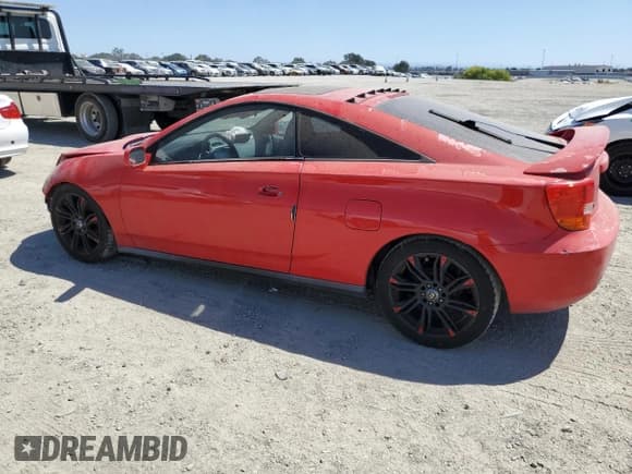 ✅ 2001 Toyota Celica GT • VIN: JTDDR32T910098088 • Lot: 67575075. Listed on Copart with 207,447 mi. Free auction sales archive from the USA and detailed vehicle history report at DreamBid. Image 2.