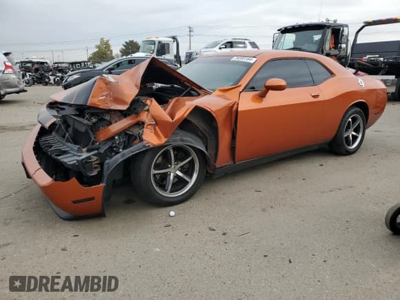 ✅ 2011 Dodge Challenger • VIN: 2B3CJ4DG4BH575131 • Lot: 76595164. Wystawiony na Copart z przebiegiem 98 305 mil. Bezpłatny archiwum sprzedaży aukcyjnych z USA i szczegółowy raport historii pojazdu na DreamBid. Zdjęcie 1.