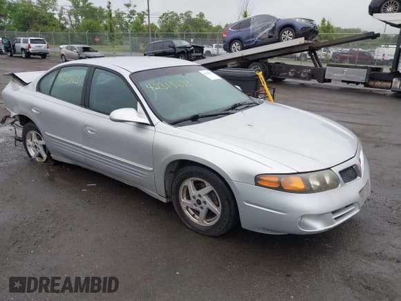 ✅ 2003 Pontiac Bonneville SE • VIN: 1G2HX52K834118938 • Lot: 42318633. Listed on IAAI with 268,213 mi. Free auction sales archive from the USA and detailed vehicle history report at DreamBid. Image 1.