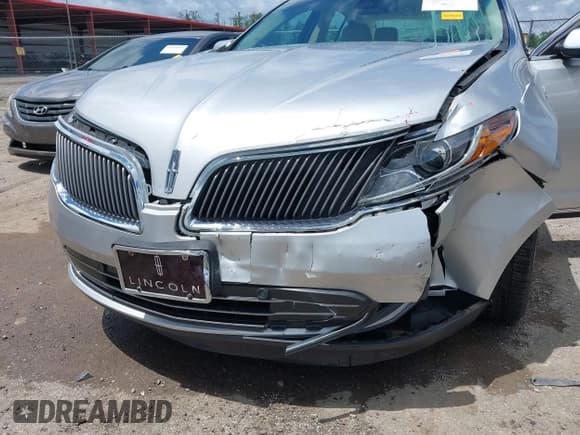 ✅ 2014 Lincoln MKS • VIN: 1LNHL9DK7EG609638 • Lot: 42522461. Wystawiony na IAAI z przebiegiem 48 785 mil. Bezpłatny archiwum sprzedaży aukcyjnych z USA i szczegółowy raport historii pojazdu na DreamBid. Zdjęcie 6.