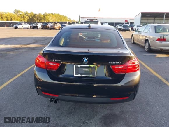 ✅ 2016 BMW 4 Series 428i xDrive • VIN: WBA4C9C57GG139464 • Lot: 43662401. Listed on IAAI with 83,876 mi. Free auction sales archive from the USA and detailed vehicle history report at DreamBid. Image 16.