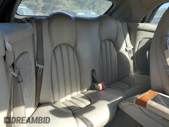 ✅ 1999 Jaguar XK • VIN: SAJGX2041XC040090 • Lot: 82702205. Listed on Copart with Not provided. Free auction sales archive from the USA and detailed vehicle history report at DreamBid. Image 10.