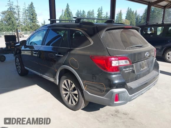✅ 2018 Subaru Outback Touring • VIN: 4S4BSETC1J3200855 • Lot: 42820553. Listed on IAAI with 134,940 mi. Free auction sales archive from the USA and detailed vehicle history report at DreamBid. Image 3.