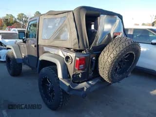 ✅ 2016 Jeep Wrangler Willys Wheeler • VIN: 1C4AJWAG0GL251884 • Лот: 43685084. Опубликован ранее на IAAI с пробегом 58 960 миль. Бесплатный доступ к архиву аукционных продаж из США и подробный отчёт об истории автомобиля на DreamBid. Изображение 3.