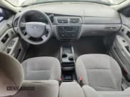 ✅ 2005 Ford Taurus SE • VIN: 1FAFP53215A244179 • Lot: 82070545. Listed on Copart with 105,426 mi. Free auction sales archive from the USA and detailed vehicle history report at DreamBid. Image 8.