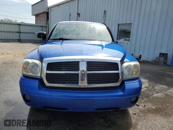 2007 Dodge Dakota SLT z VIN 1D7HW48P17S215885, wystawiony jako Copart lot #47779764 z przebiegiem 141 401 mil mil oraz Szkoda całkowita • Salvage title. Historia ofert i sprzedaży dostępna na DreamBid. Obrazek 5.