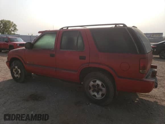 2003 Chevrolet Blazer LS z VIN 1GNDT13X83K135413, wystawiony jako Copart lot #71185894 z przebiegiem Nie podano mil oraz Szkoda całkowita • Salvage title. Historia ofert i sprzedaży dostępna na DreamBid. Obrazek 2.