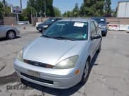 ✅ 2003 Ford Focus ZX3 • VIN: 3FAFP31Z03R173760 • Lot: 42458510. Listed on IAAI with 147,663 mi. Free auction sales archive from the USA and detailed vehicle history report at DreamBid. Image 6.