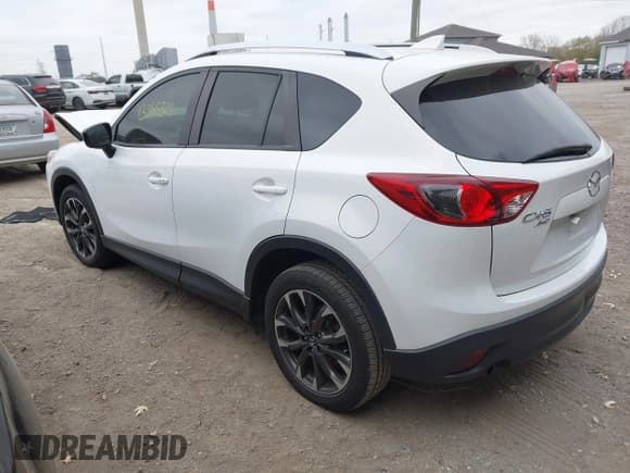 ✅ 2016 Mazda CX-5 Grand Touring • VIN: JM3KE4DY6G0873688 • Lot: 43565324. Wystawiony na IAAI z przebiegiem 80 920 mil. Bezpłatny archiwum sprzedaży aukcyjnych z USA i szczegółowy raport historii pojazdu na DreamBid. Zdjęcie 3.
