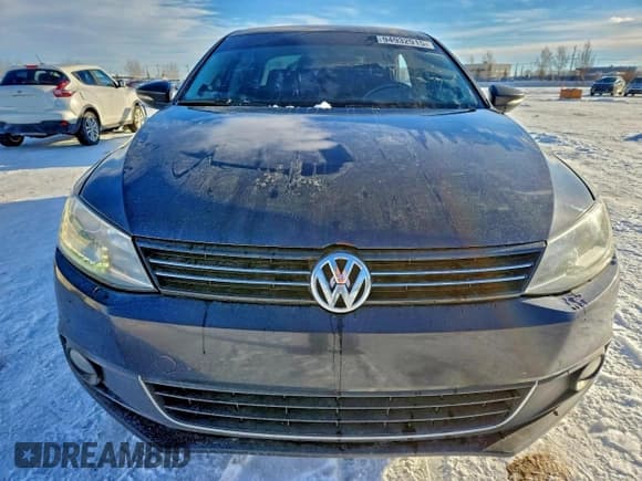 ✅ 2013 Volkswagen Jetta Hybrid • VIN: 3VW637AJ2DM287066 • Lot: 94932915. Wystawiony na Copart z przebiegiem 174 347 mil. Bezpłatny archiwum sprzedaży aukcyjnych z USA i szczegółowy raport historii pojazdu na DreamBid. Zdjęcie 5.